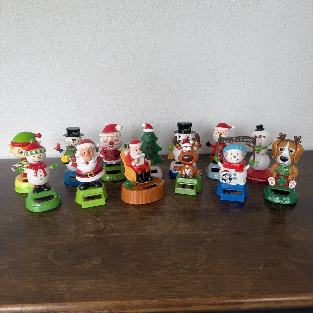 Lot of 13 Dancing Solar Powered Bobble Heads Christmas Santa Snowman Puppy Elf